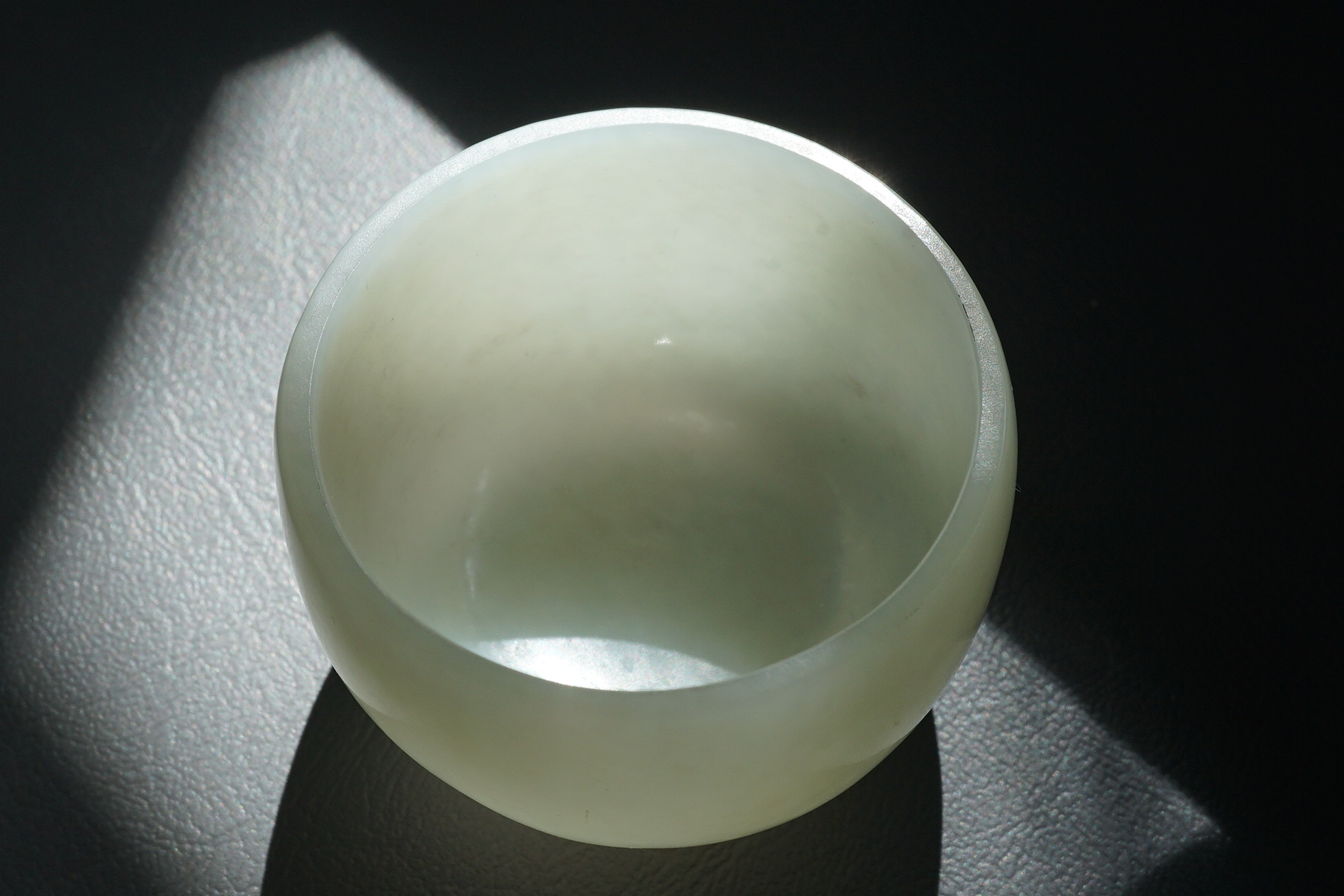 A pair of Chinese white jade cups, Qing dynasty or later